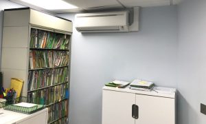 A high wall unit at a consultation room at Chelsea Pharmacy, recently air conditioned by Cool You